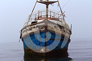 Derelict fishing boat waiting to sink or be renovated
