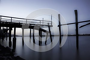 Derelict fishing jetty at dusk