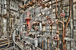 Derelict industrial boiler room in a disused factory