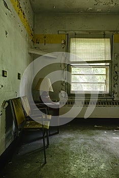 Derelict Room with Chairs and Lamp - Abandoned Hospital