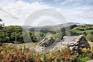 A Derelict stone building with a broken roof