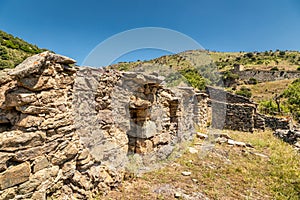 Derelict stone farm buildings in Balagne region of Corsica