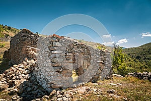 Derelict stone farm buildings in Balagne region of Corsica