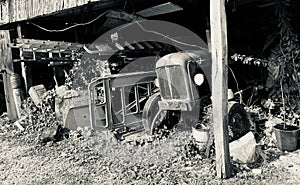 Derelict tractor in abandoned building 2