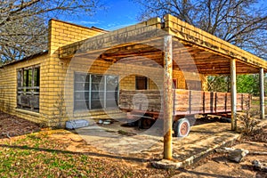 Derelict Wagon Parked at Abandoned Gas Station