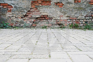 Derelict wall and pavement background