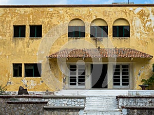 Derelict yellow villa, Lost Place, Eleousa, Rhodes Island, Greece.