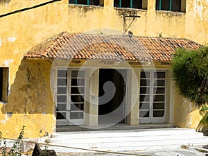 Derelict yellow villa, Lost Place, Eleousa, Rhodes Island, Greece.