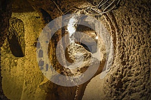 The Derinkuyu underground city is an ancient multi-level cave city in Cappadocia, Turkey.