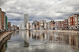 Derivation of river Meuse under cloudy sky in Liege