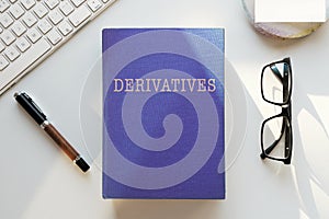 Derivatives or financial contracts book illustration photo