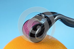 Derma roller for medical micro needling therapy with orange