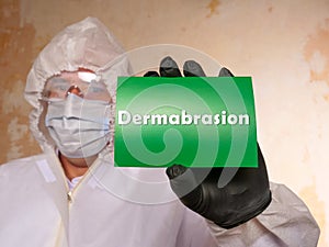 Dermabrasion inscription on the piece of paper photo
