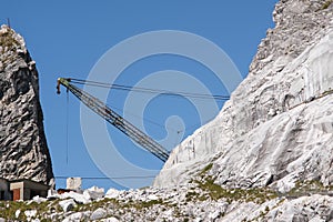 Derrick crane in a white marble quarry in the Apuan Alps