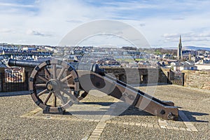 Derry Londonderry city walls and cannon