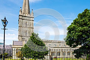 Derry, North Ireland. Aerial view of Derry Londonderry city center in Northern Ireland, UK. Sunny day with cloudy sky