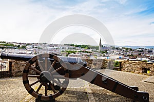 Derry, North Ireland. Aerial view of Derry Londonderry city center in Northern Ireland, UK. Sunny day with cloudy sky