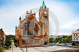 Derry, North Ireland. Aerial view of Derry Londonderry city center in Northern Ireland, UK. Sunny day with cloudy sky