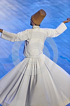 Dervish spirituality dancer in Mevlana culture center. Sema. Konya, Turkey