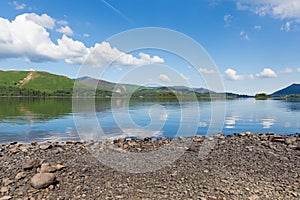 Derwent Water Lake District Cumbria England uk south of Keswick blue sky beautiful calm sunny summer day