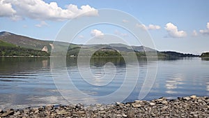 Derwent Water Lake District uk south of Keswick blue sky beautiful calm sunny summer day PAN