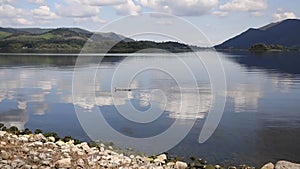 Derwent Water Lake District uk south of Keswick blue sky beautiful calm sunny summer day PAN