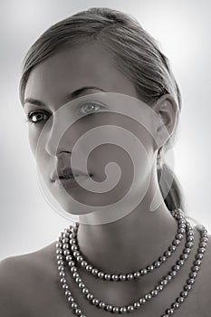 Desaturate lady with pearl