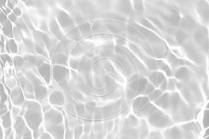 Desaturated transparent clear calm water surface texture