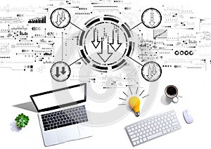 Descending arrows with computers with a light bulb