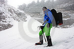 Descending from Piatra Craiului ridge on a very cold winter day