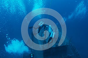 Descending Scuba Divers