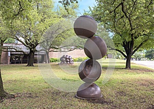 `Descending Spheres` and `Malthusian Conception` in front of the Lakewood Library in Dallas, Texas.