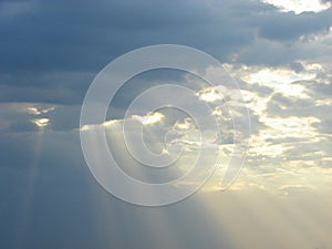 Descent of Divine Blessings from Sky - Sun Rays through Clouds