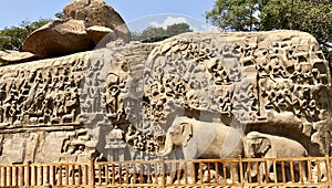 Bas relief rock cut sculptures of Gods, people and animals carved in monolithic rock