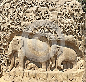 Bas relief rock cut sculptures of Gods, people and animals carved in monolithic rock