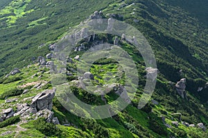 Descent from the mountain range between the boulders