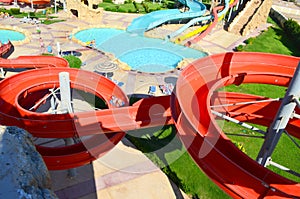 Descent on the water slide in aqua park. View from above