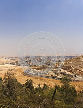 Desert area of West Bank and palestinian towns and villages behind the West Bank separation wall