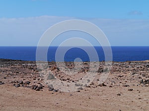 The desert and the Atlantic ocean on Fuerteventura photo