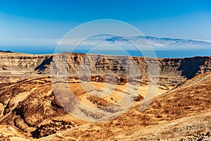 Desert crater and Canary Islands La Gomera and El Hierro in sea from Pico del Teide mountain in El Teide National park. Tenerife,