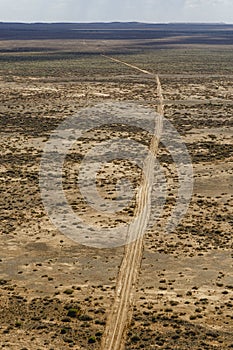 Desert dirt road aerial view, middle of nowhere concept near the outback town of Marree South Australia