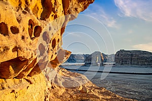 Desert erosion formations with elephant rock in the background,  near Al Ula, Saudi Arabia photo