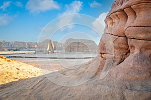 Desert erosion formations with elephant rock in the background,  near Al Ula, Saudi Arabia photo