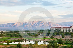 Desert Golf Resort with Purple Mountains in Distance