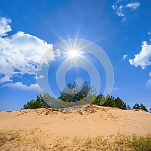 desert hill in light of sparkle sun