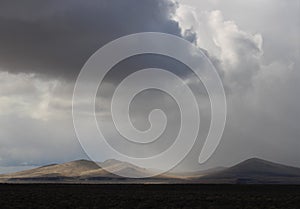 Desert Hills Clouds and Rainstorm