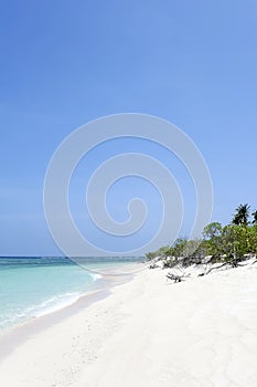 Desert island beach blue sky background