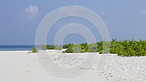 A desert island with a white sand in the Indian ocean Ari Atoll, Maldives