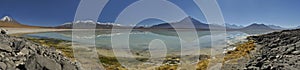 Desert lake insane vibrant reflection of mountains at altiplano, Bolivia