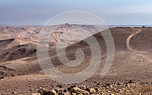 Desert landscape with bedouin settlement in the Judaean Desert, Israel.
